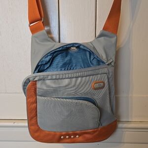 Light Gray and Orange Crossbody Sling Bag - Tumi